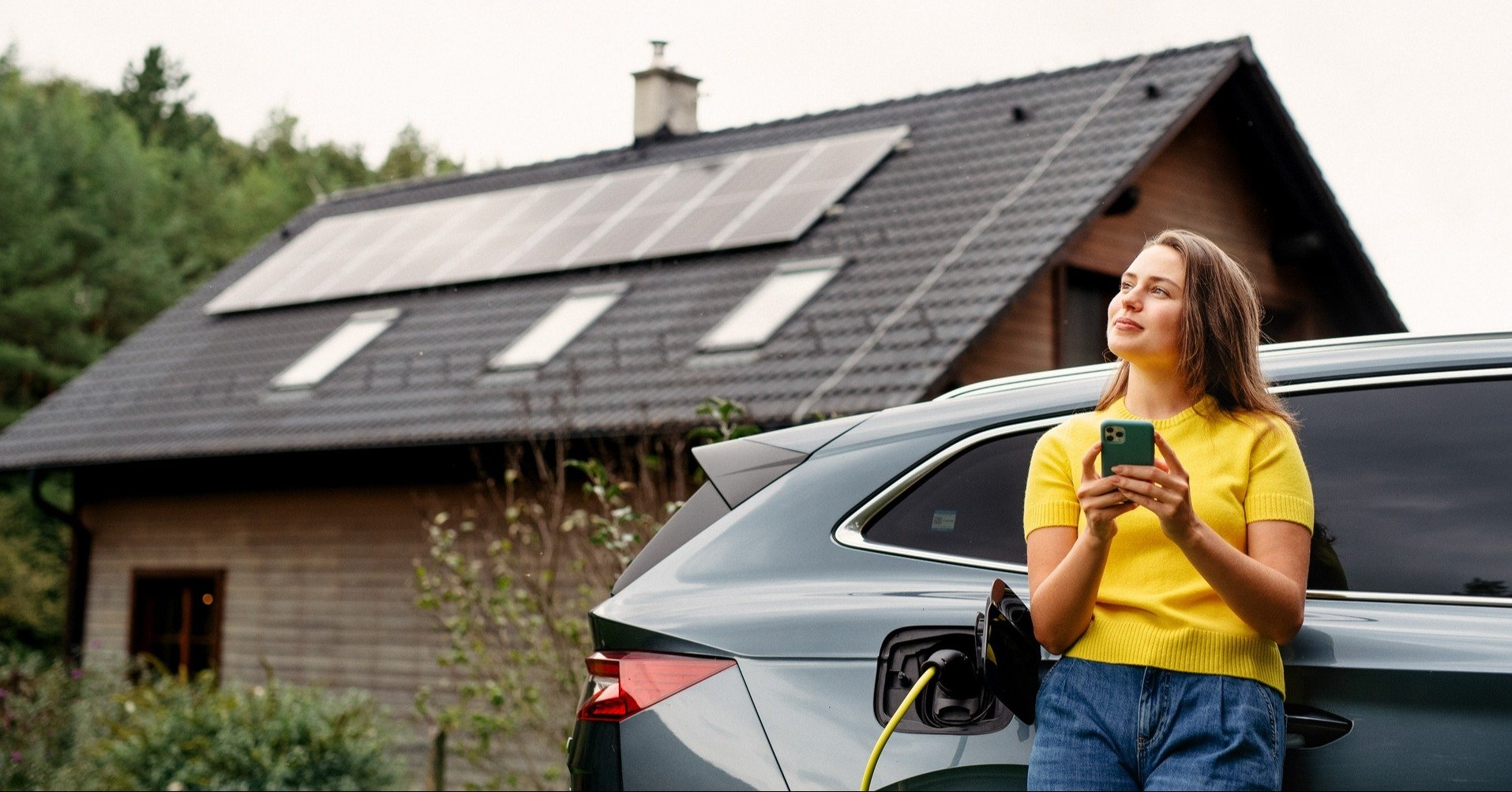 Woman with EV and solar